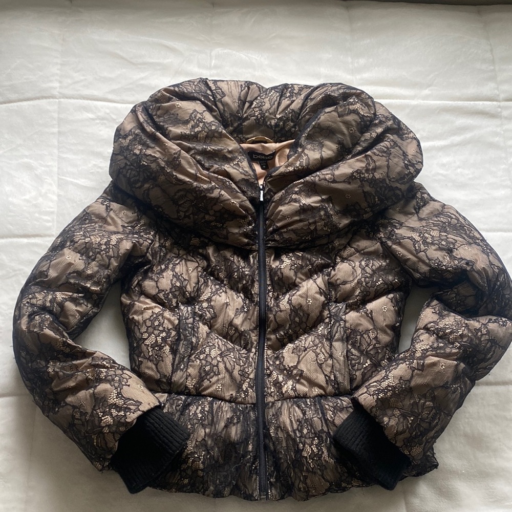 Woman jacket size S %70 down %30 feathers .combination of tan and black lace